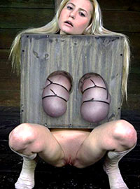 Blonde fuck toy in the wooden box gives all her holes for fuck and tits for torture